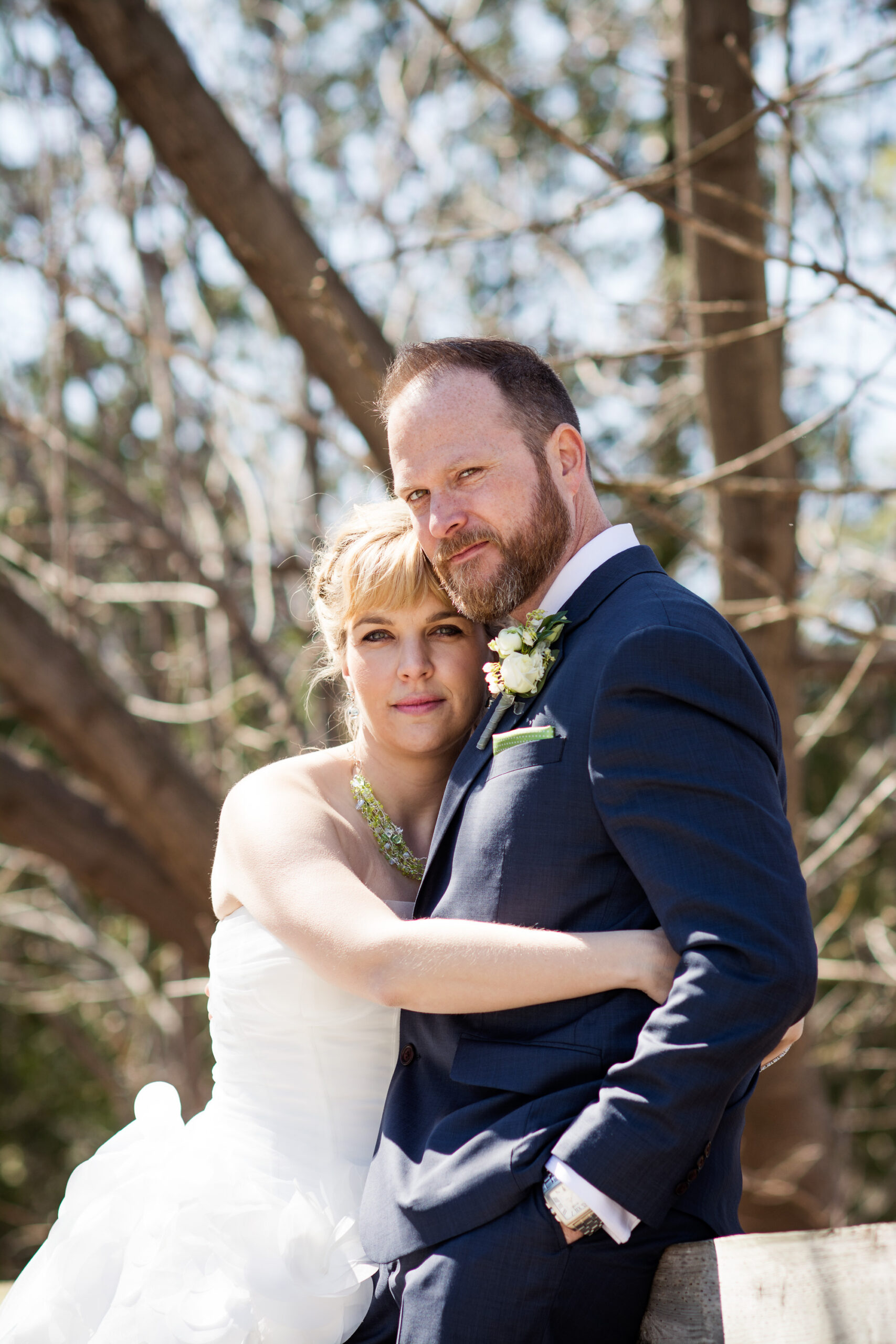 Bride and groom embracing during an outdoor wedding portrait session in the GTA
